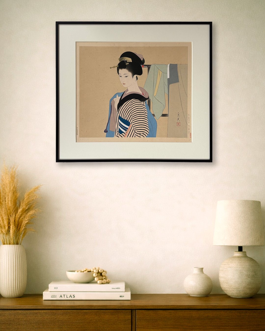 Encadrement sur mesure d'une estampe japonaise avec passe-partout et cadre noir minimaliste.